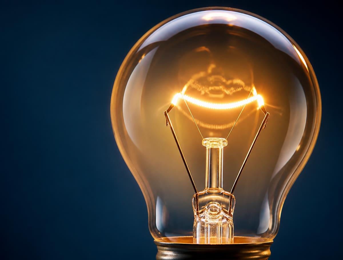 Close-up of a glowing light bulb filament